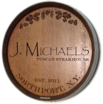I5-JMichaels-Tuscan-Steak-House-Barrel-Head-Carving                                     